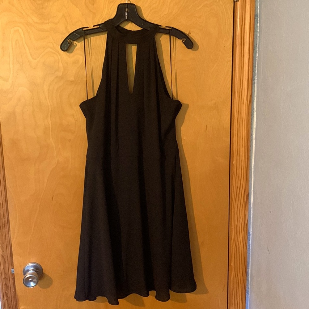 Express black dress. Has black rayon slip underneath. Keyhole top.